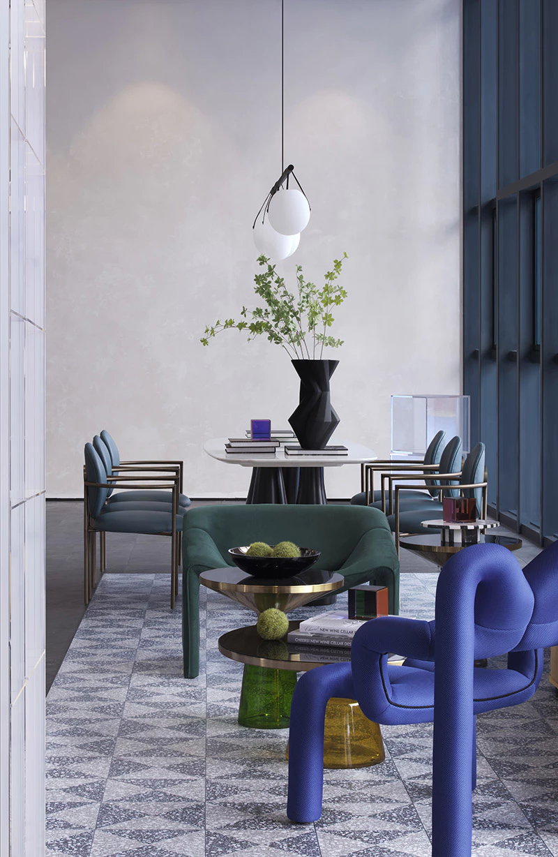 Eclectic dining area with colorful designer chairs and pendant light